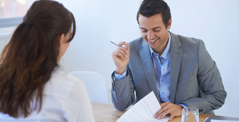 Permanent recruitment: recruitment agency conducting an interview.